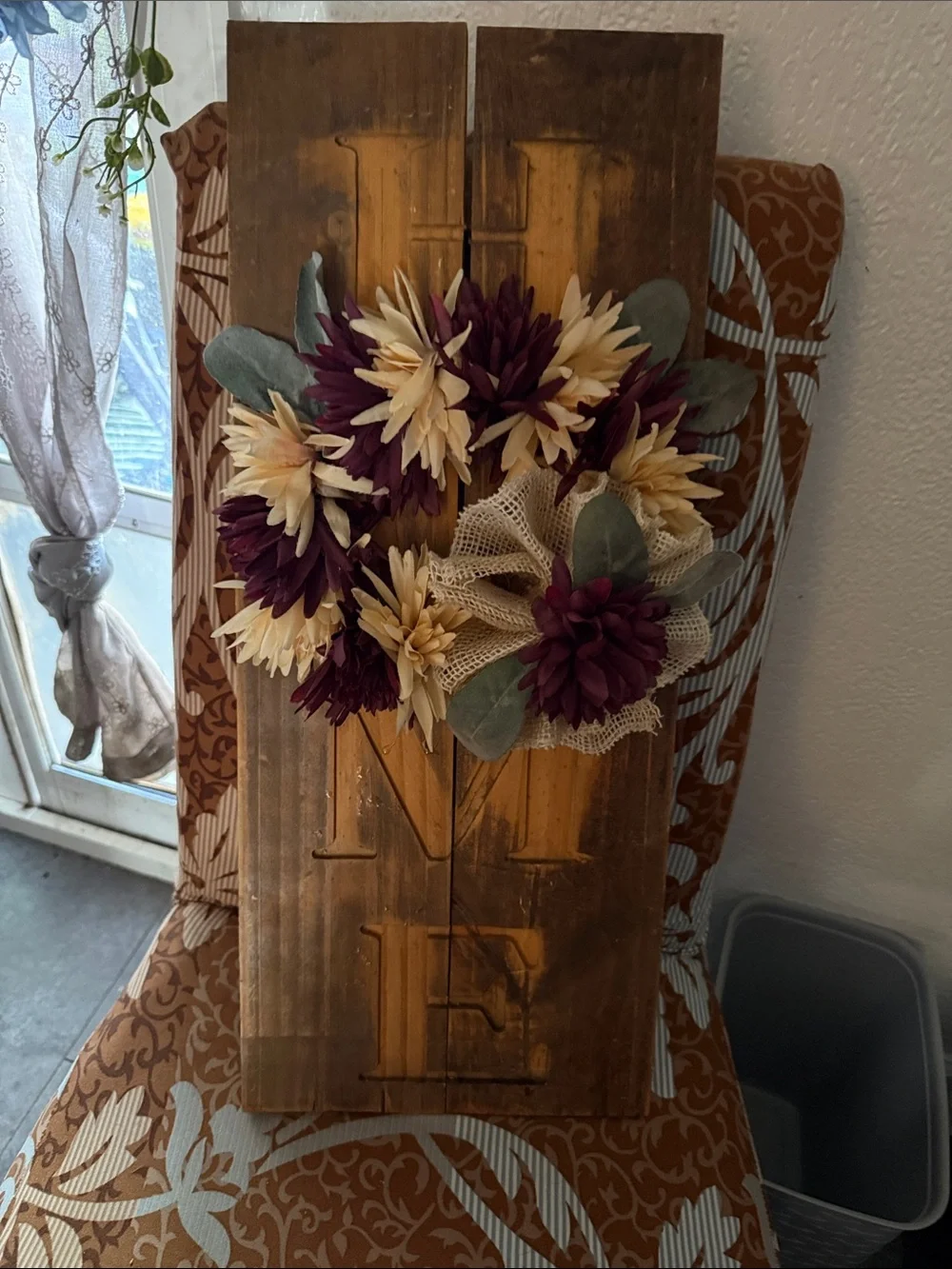 Wooden 'NE' Wall Sign with Burgundy and Cream Faux Floral Wreath